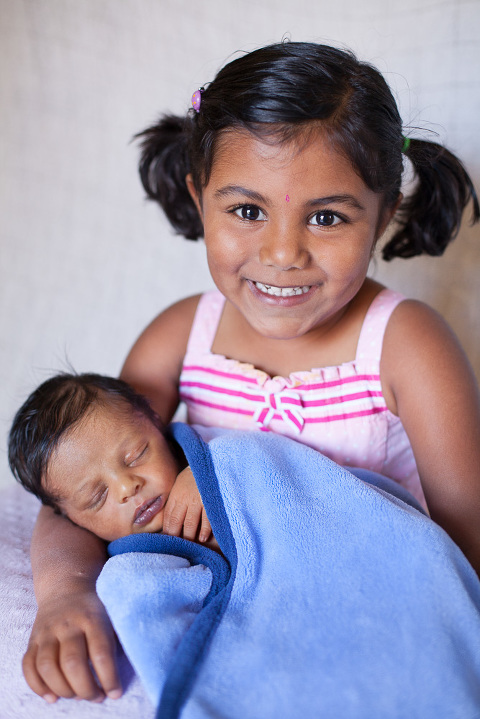 newborn-baby-boy-and-sister