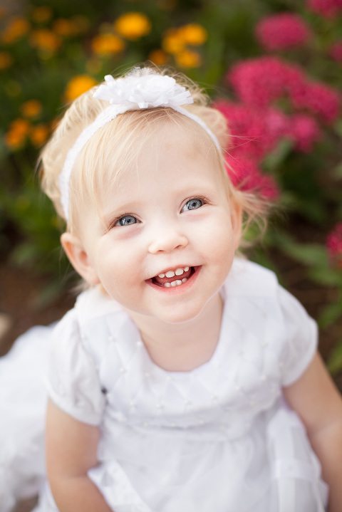 baby-girl-colorful-flowers-temple-white-dress